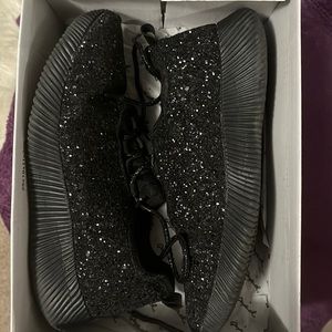 Black glitter tennis shoes. Used and in good condition! Smoke free home.